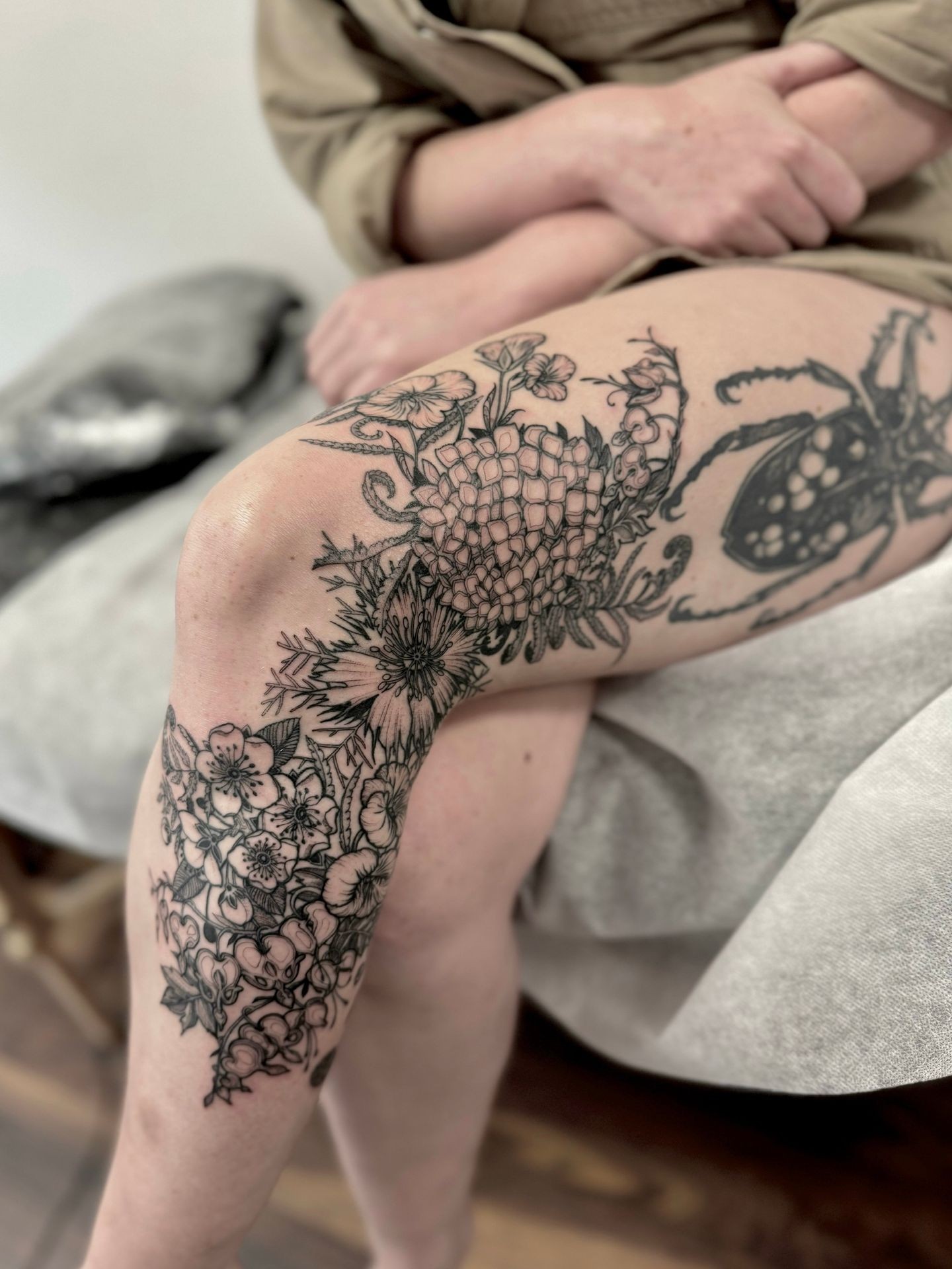 Custom freehand flower botanical tattoo